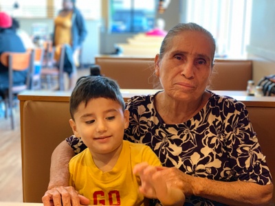 My grandmother and my brother at a restaurant.
