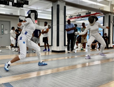 Me and my friend fencing in the summer. 