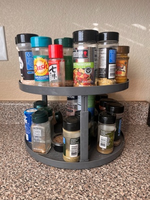 Spice rack with various seasonings.