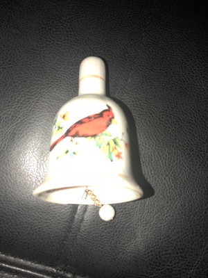 This is my great grandmothers bell with a cardinal on it
