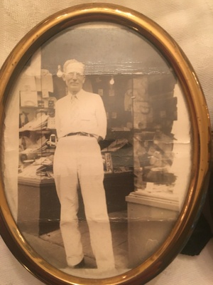 My great grandfather standing in front of his haberdashery on Cortland Street.