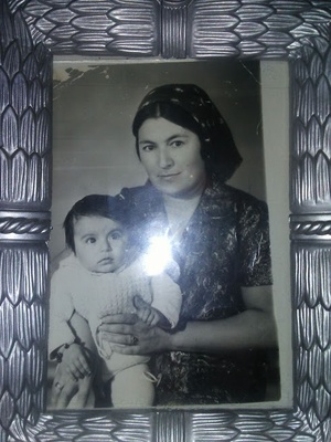 this is an old photo of my grandma/ mom
