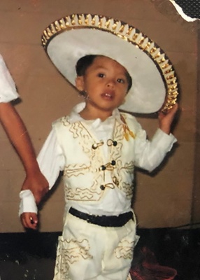 Young me wearing a traditional charro 