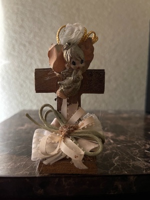 Tiny cross with an Angel on it 