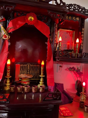Red Chinese altars with lights and cups 