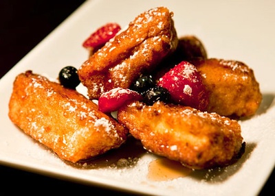 French toast with syrup and berries