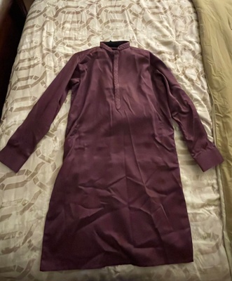 My shalwar kameez on the bed as I get ready for Eid