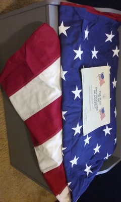 American flag with certificate