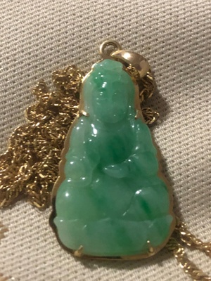 This is a buddha necklace. 