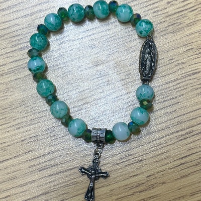 Green beads, Virgin Mary charm, & Cross