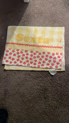 A yellow and red towel 