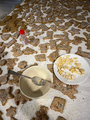 A table full of cookies being made