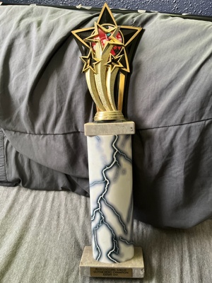 My dad's guitar hero trophy