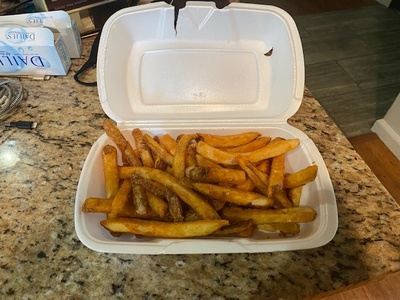 french-fries in a styrofoam container