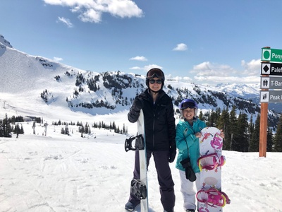Me and My mom with our snowboards