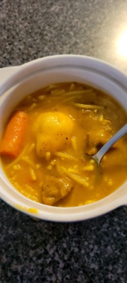 A bowl of soup joumou.