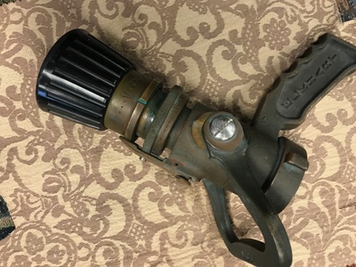 The fire hose nozzle used to extinguish the fire aboard the USS Miami Submarine  
