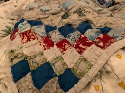 Hand stitches baby blanket made for me.