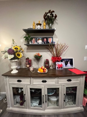 Altar with photos and flowers. 