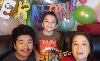 My mom, little brother, and I on his birthday.