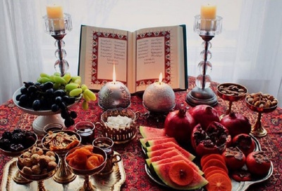 fruits,nuts and book of poetry of a famous old iranian poet