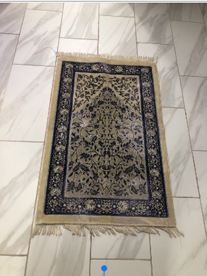 Prayer mat on the floor