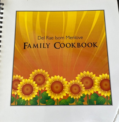 White book with sunflowers on the cover
