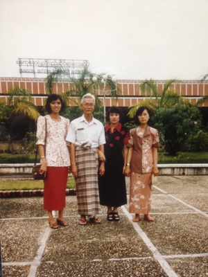 My mom, third, before she left Myanmar.
