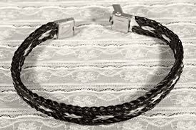 Black Bracelet with a Metal piece