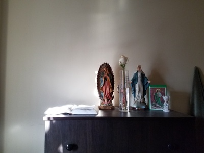 Some saints, the Virgin Mary, and Bible