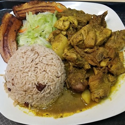 Curry chicken w/ rice & peas & plantains