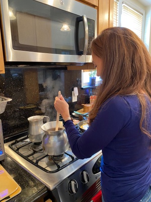 My mom stirring the hot chocolate