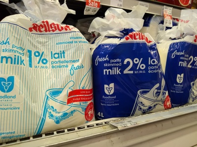 bags of milk on shelf