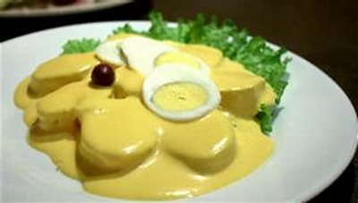 Potatoes with spicy cheese sauce