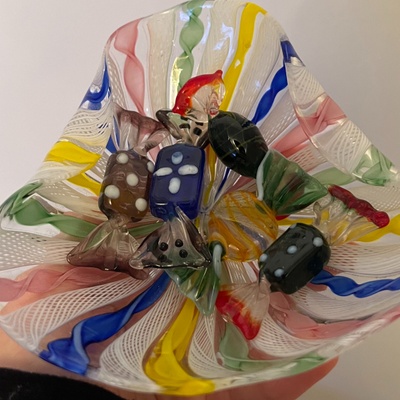 glass bowl filled with glass candies