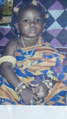 me wearing Tem bissaou when I was little