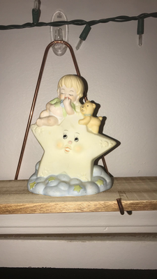 porcelain star with angel on top