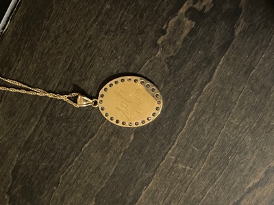 Engraved back of pendant 