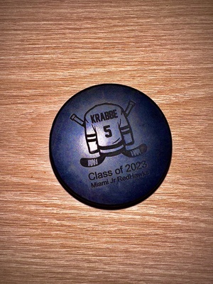 The Hockey Puck given to me as a senior.