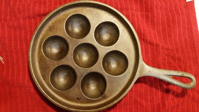 This is the pan that is used to make Ableskivers.  