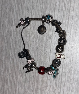 Silver bracelet with colored charms