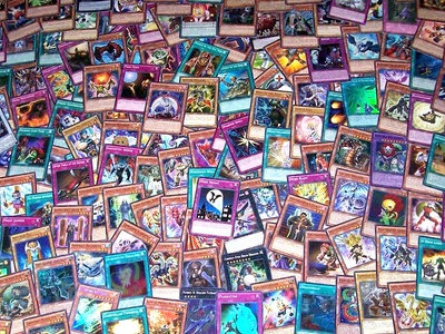 a Pile of Yu-Gi-Oh Cards