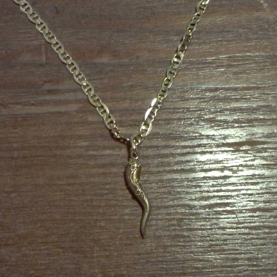 Golden necklace with pendant