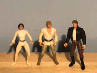 Leia, Luke, and Han figures