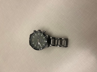 A metal, adjustable watch