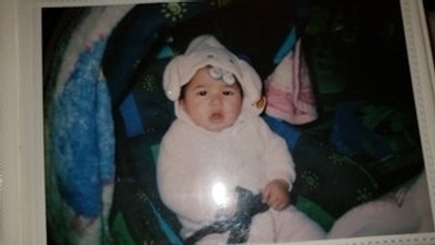 A baby picture of me in a bunny outfit 