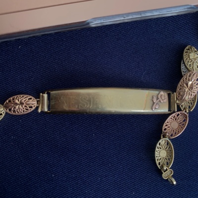 Bracelet up close with "Yesenia" engraved on it