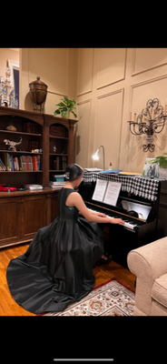   My beloved daughter plays the piano.