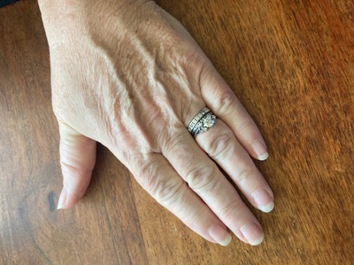 Mother's hand with rings