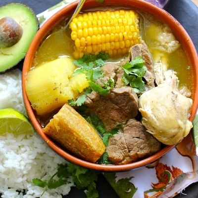Sancocho with corn,meat,yuca,platano,pollo,rice,aguacate.